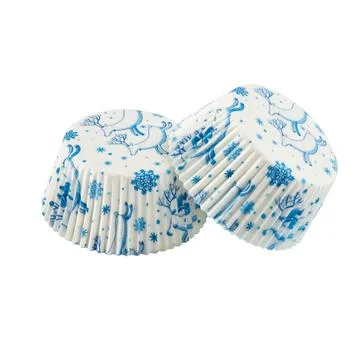 White paper baking forms for muffins and cupcakes with New Year winter patter Stock Photos