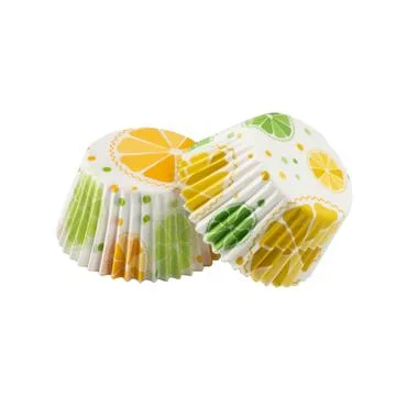 White paper baking forms for muffins and cupcakes with citrus pattern Stock Photos