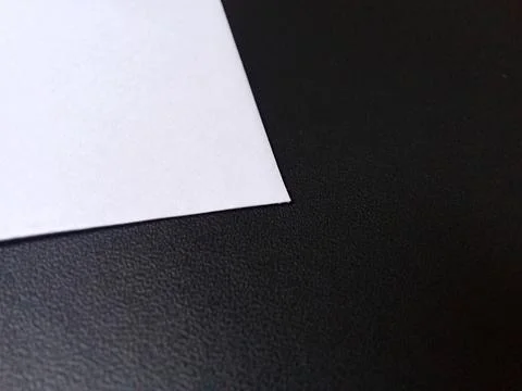White paper on a black background. Foto stock