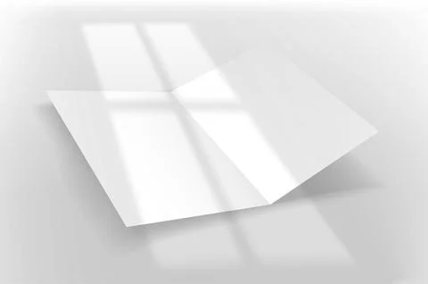 White paper booklet on a table with light of the window shadow overlay. Reali Stock Illustration