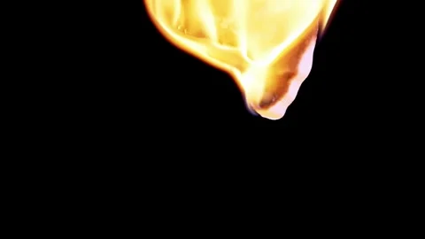 White Paper Edge Burning With Bright Orange Flame Against Black Background Vidéo 330301468