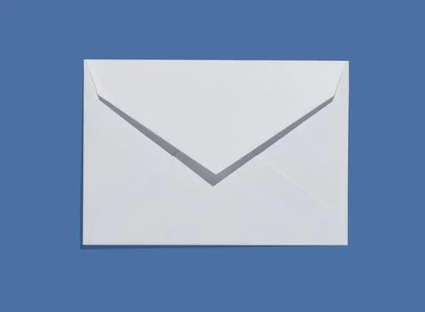 White paper envelope on blue background template mockup Stock Photos