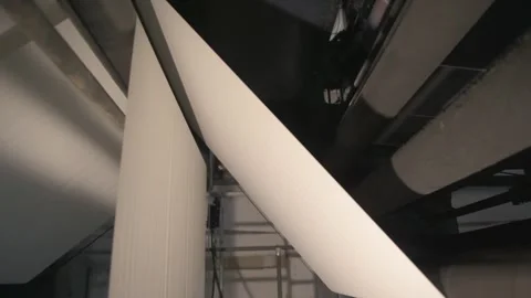 The white paper is getting transported by a printing press. Stock Footage 245069110