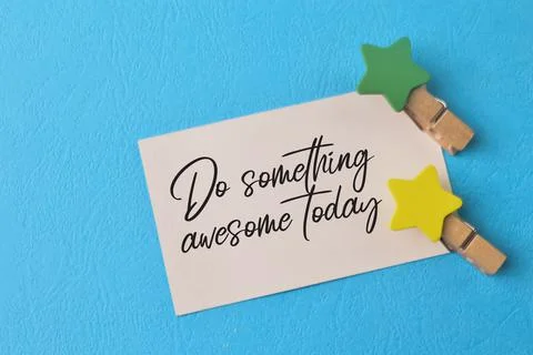 White paper with phrase DO SOMETHING AWESOME TODAY Stock Photos