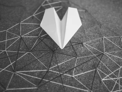 White paper plane over the threads linking the nails. Entities connected. Abs Stock Photos