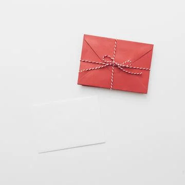 White paper with red envelope. High quality and resolution beautiful photo Stock Photos