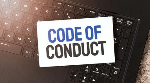 White paper sheet with text Code of Conduct on the black laptop Foto stock
