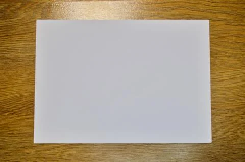 White paper sheet on wood pattern and texture for background 스톡 사진