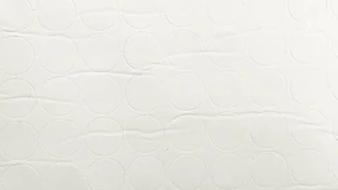 White paper sheets with perforated round circles texture background for packa Foto stock