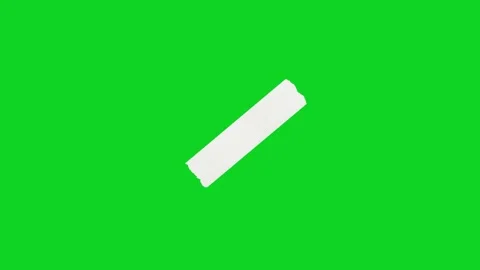 White paper strip diagonal cut bottom right revealing animated on green screen Stock Footage 335216501
