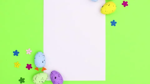 White paper for text and Easter eggs decoration on green theme. Stop motion 스톡 동영상 149330849