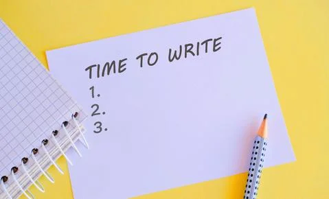 White paper with text TIME TO WRITE on yellow background. Business Concept Stock Photos