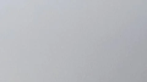 White paper texture background with subtle grain surface. Stock Photos