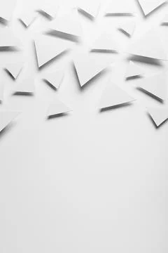 White paper triangles as abstract pattern in bright light with soft light sha Stock Photos