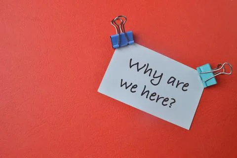 White paper written with question WHY ARE WE HERE? Stock Photos