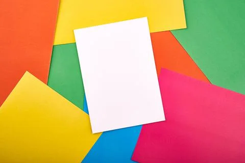 White papers for text on the background with colored cardboards. Preschool craft Stock Photos