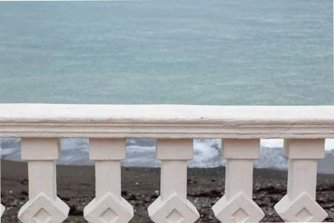White parapet on the seafront Stock Photos