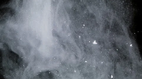 White particles and ink moving around, slow motion Stock Footage 44346441