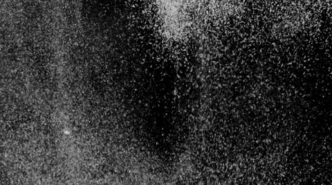 White particles falling down in slow motion like snow flakes in a storm Stock Footage 56287185