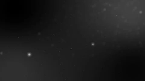 White particles fly down on a black background. Stock Footage 254771494