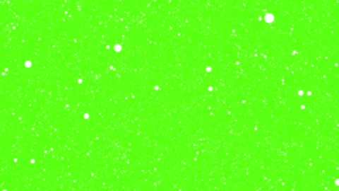 White particles flying on green chroma key background. Winter snow, falling snow Stock Footage 308805652