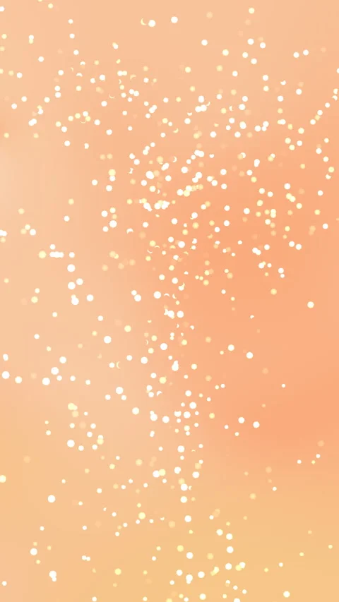 White Particles Gently Drifting on Soft Peach Background Vidéo 334492598