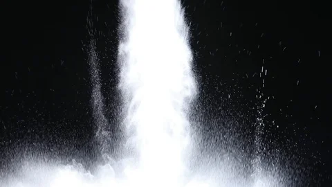 White particles of powder blasting in slow motion. Isolated on black background Stock Footage 87318509