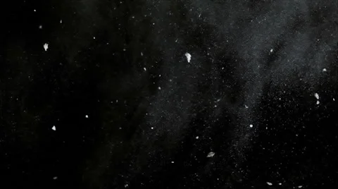 White particles slowly moving and ink on black background Stock Footage 42943343