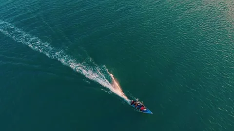 White path on water from ship on ocean surface in Guatemala. top view of ship Stock Footage 249882642