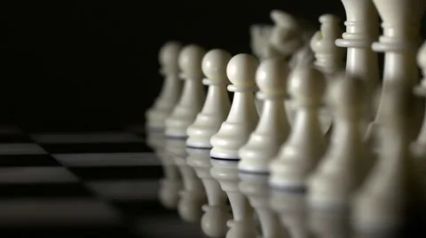 White Pawns Lined Up on Marble Chess Board Stock Footage 61406598