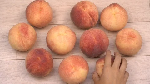 White peaches on a visible background.  Stock Footage 113643946