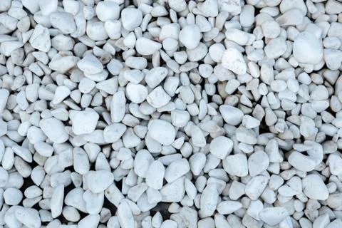 White pebble texture. Small stone background Stock Photos