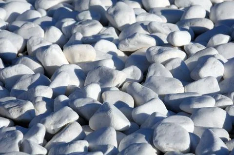 White pebbles on the beach Stock Photos