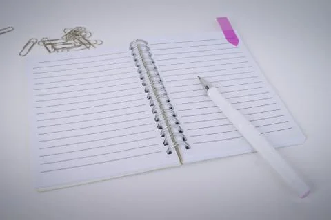 White pen, Notepad, scraper objects in the Office macro photo Stock Photos