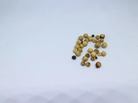 White pepper grains Stock Photos