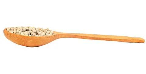 White pepper peas in spoon Stock Photos