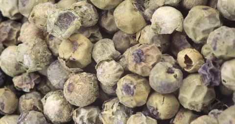 White peppercorns close up Stock Footage 97798887