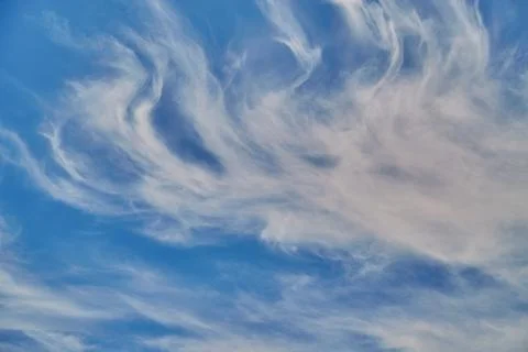 White perispherical clouds in the sky close-up, cloud formation, cloud corona Foto stock