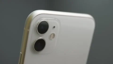 White phone with two lens camera on the back. Photography concept Stock Footage 250515468