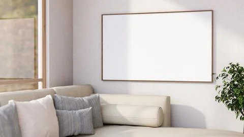 White photo frame on wall over beige sofa with cushions in modern living ro.. Stock-Illustration
