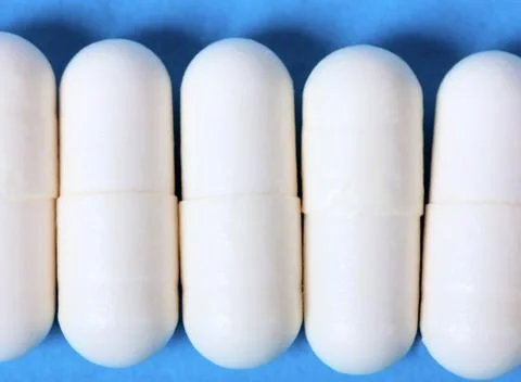 White pill Stock Photos