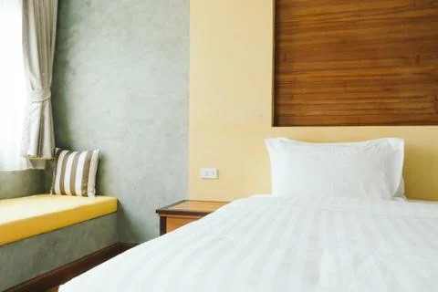 White pillow on bed Stock Photos