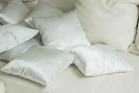 White pillows on a bed Comfortable soft pillows on the bed Stock Photos