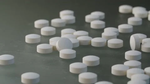 White pills and brown on the table Stock Footage 140323312