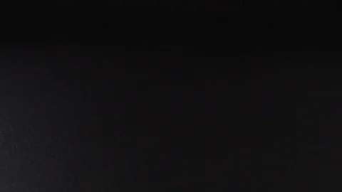 White pills on a black background with close up Stock Footage 127183455