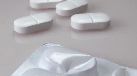 White pills generic, close up Video stock 39996536