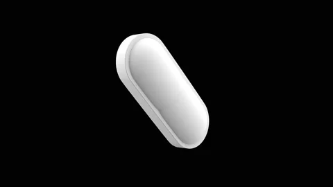 White pills isolated rotating. Seamless looping. Alpha channel / Luma matte. Video stock 132939046