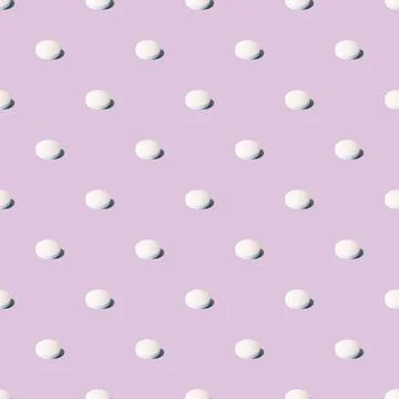White pills on a lilac, violet background. Seamless pattern for the background. Stock Illustration
