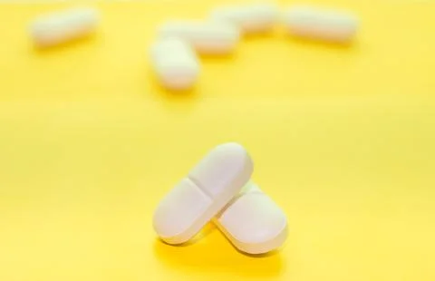 White pills macro Stock Photos
