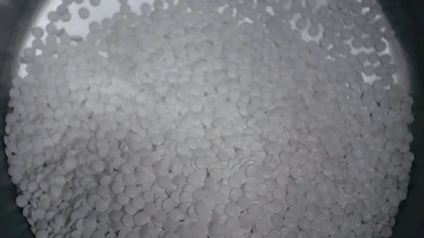 White pills mixing close up Video stock 76740627